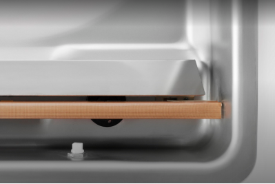 Plaque d'insertion inclinée pour produit liquide